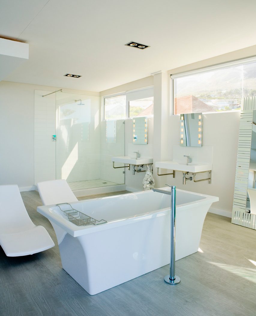 Clean modern bathroom — fixture and finish plumbing by Cooper Perry Plumbing